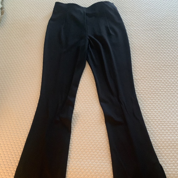 Peach nylon spandex black flare pants. NWOT - Picture 1 of 5